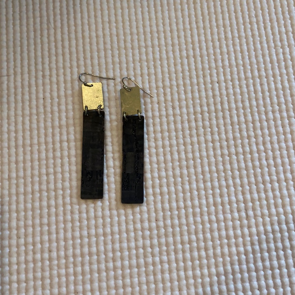 Boutique long dangling earring. Gold at top and charcoal color.